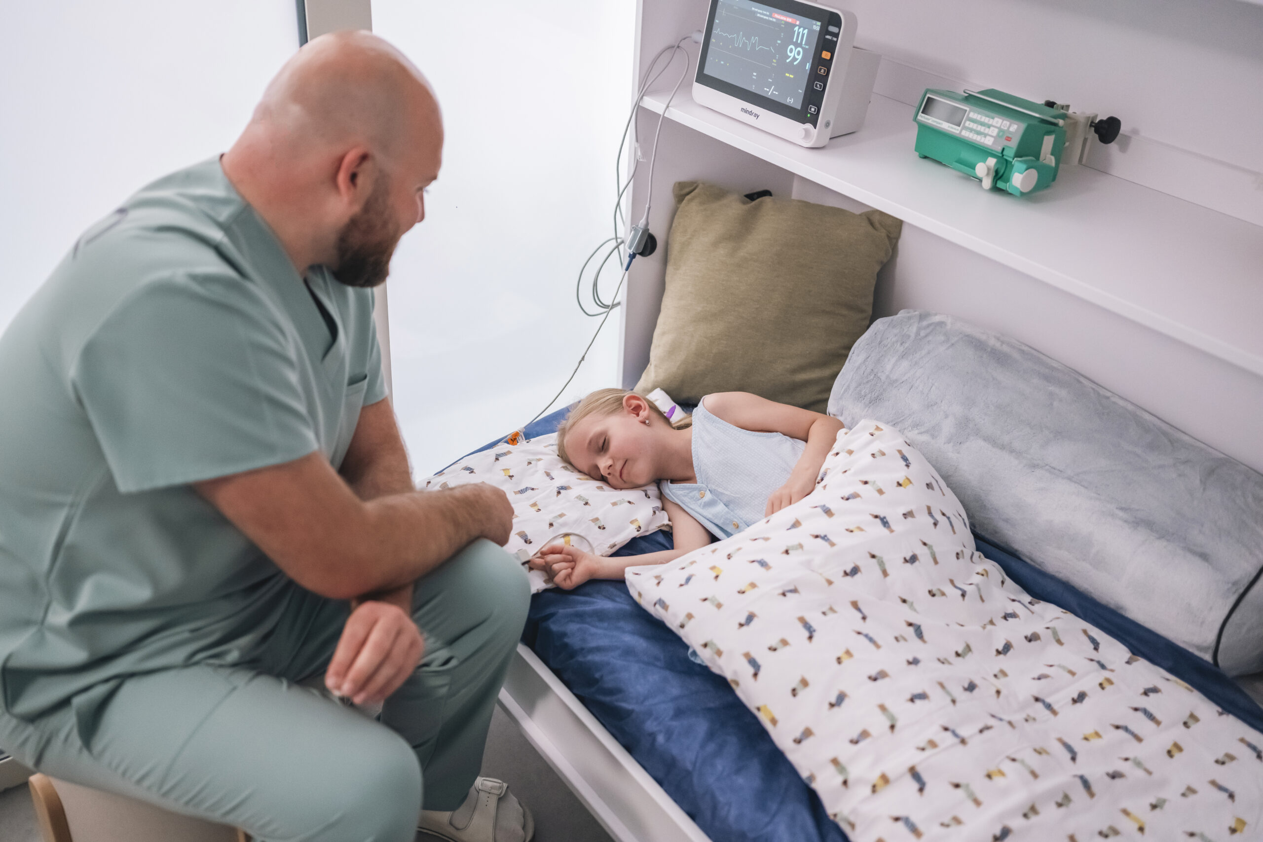 Child in a recovery room after dental treatment under general anesthesia
